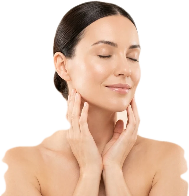 Woman with glowing skin resting her fingertips along her jaw