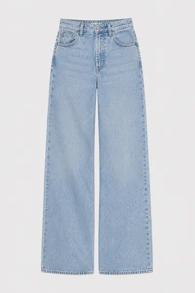 Light indigo straight-leg jeans photographed flat on a pale grey ground