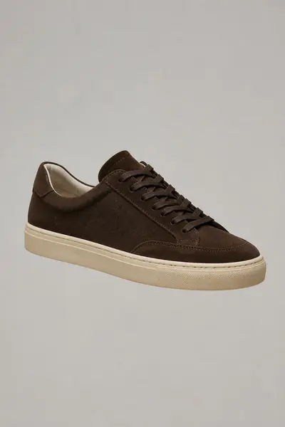 Suede runner with a cream gum sole photographed in three-quarter view
