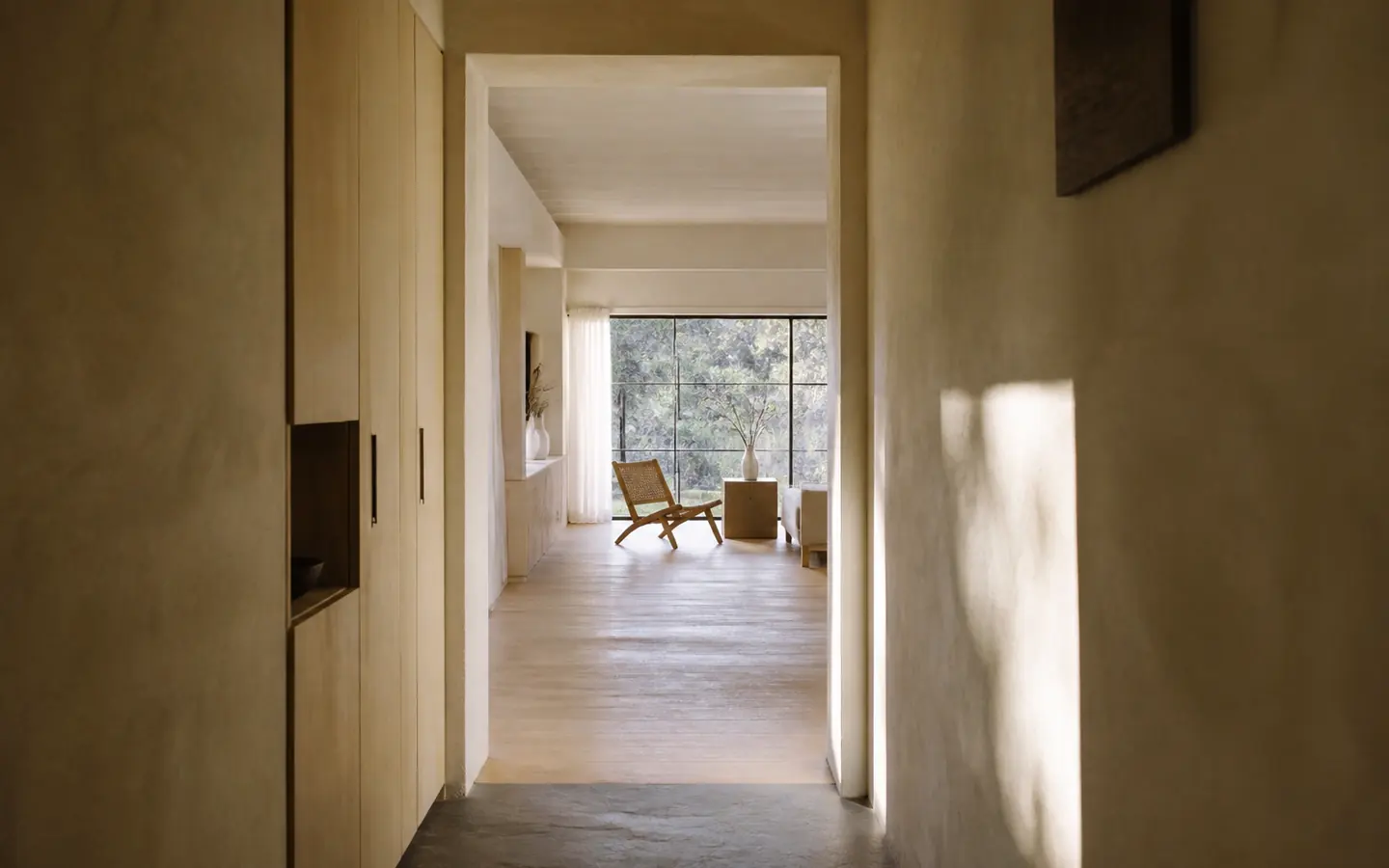 Alder Court seen from the hallway with light across the plaster wall