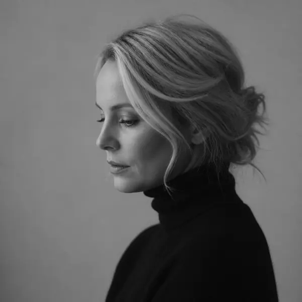 Studio portrait of a junior designer in a black turtleneck