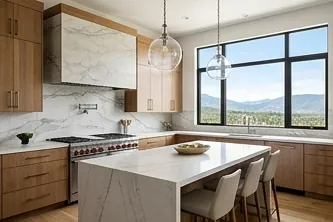 Open kitchen with an island and mountain views