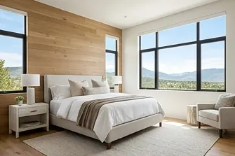Primary bedroom with a wood accent wall
