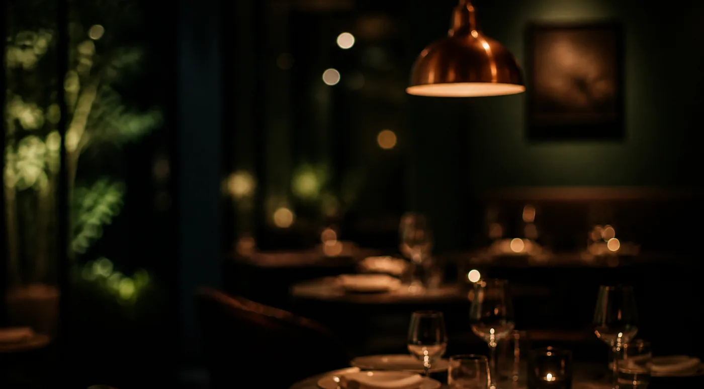 The dining room after service has started, lamps low
