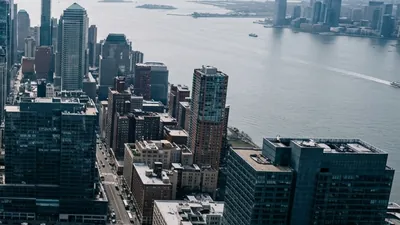 City skyline illustrating the manufacturing acquisition matter