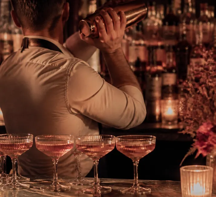 Glassware set out along the counter before service