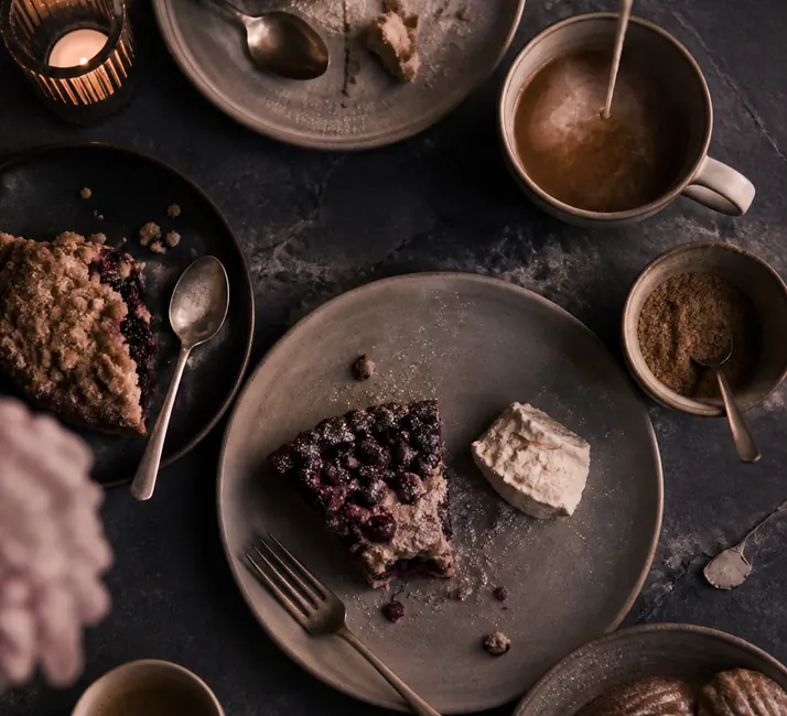 The dessert counter with pastries and espresso cups